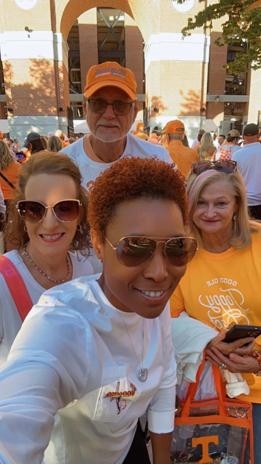 Camisha with family and friends at a game day gathering